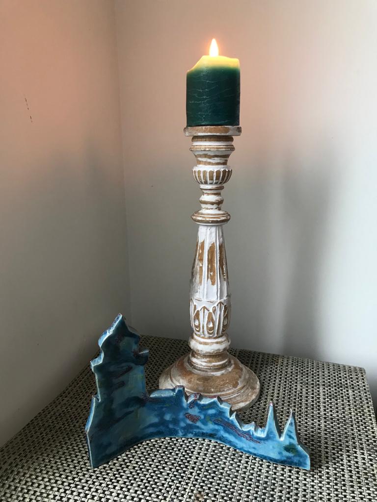 Een kaars branden tijdens de week van gebed